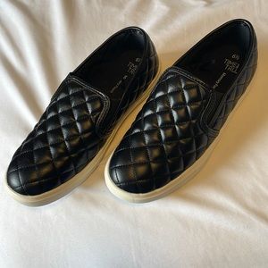 Black Checkered Puffed Slip On Sneakers